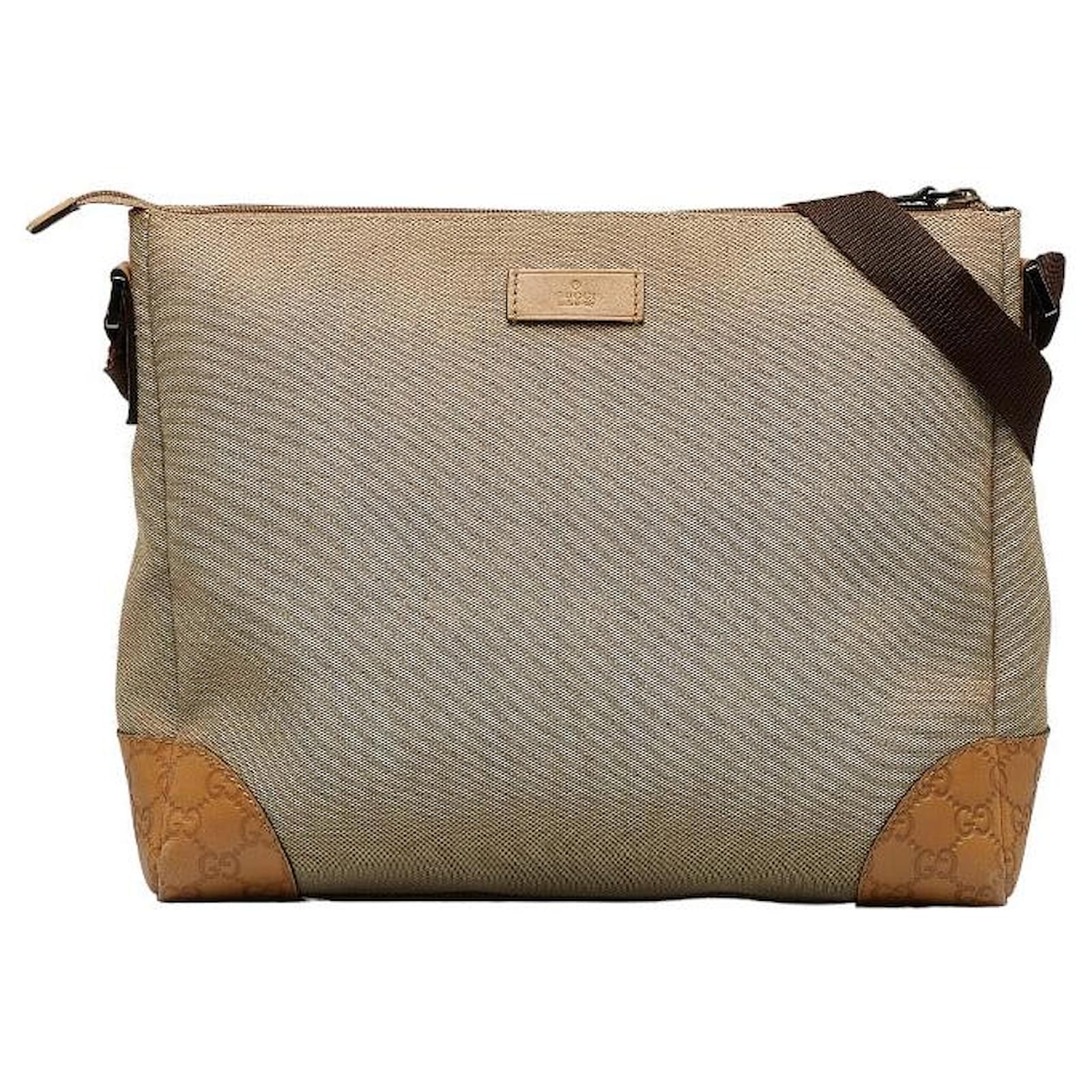 Leather-trimmed canvas messenger bag