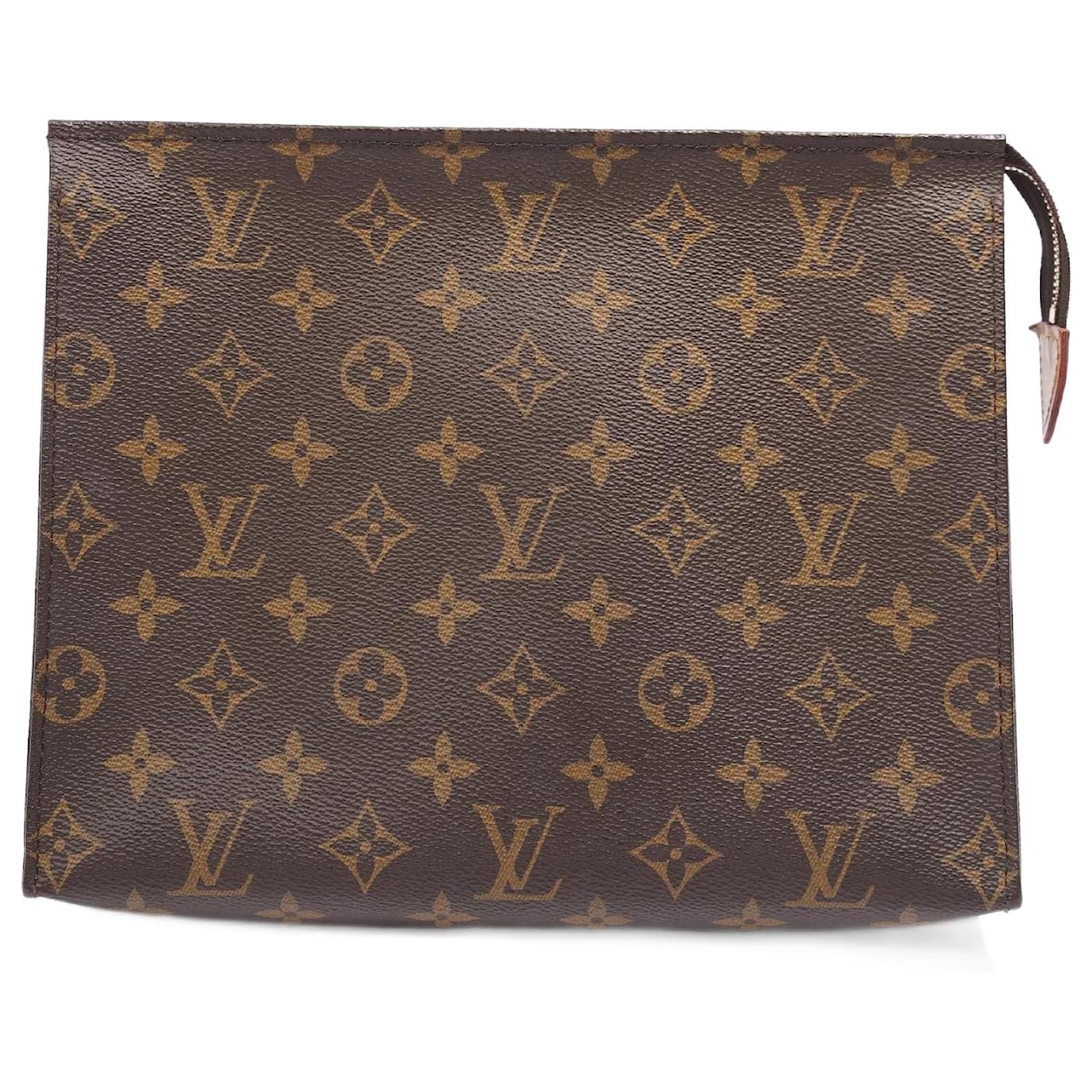 LOUIS VUITTON Bolso de mano de lona con monograma y deta…