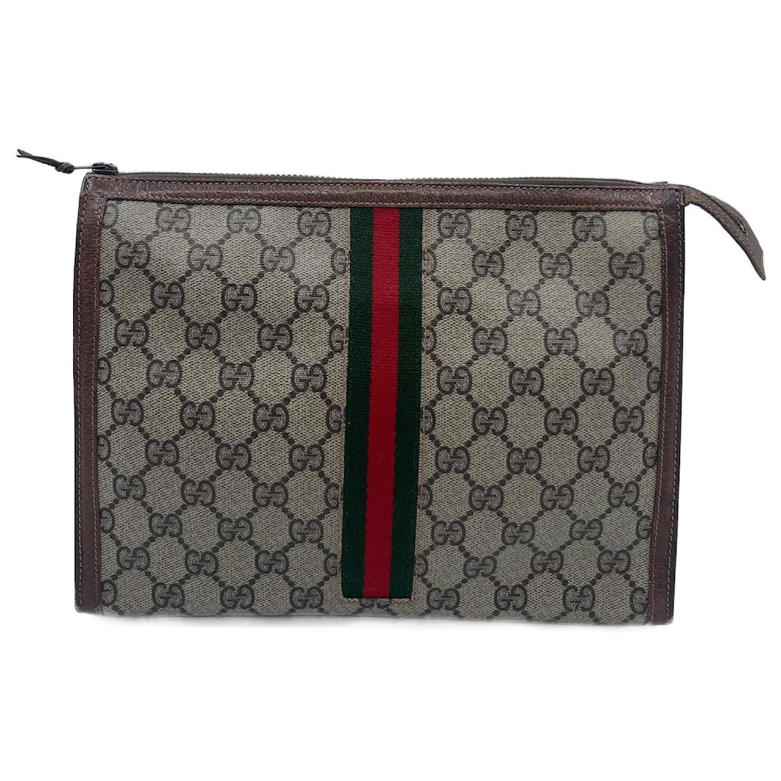 Pochette Gucci en toile enduite marron