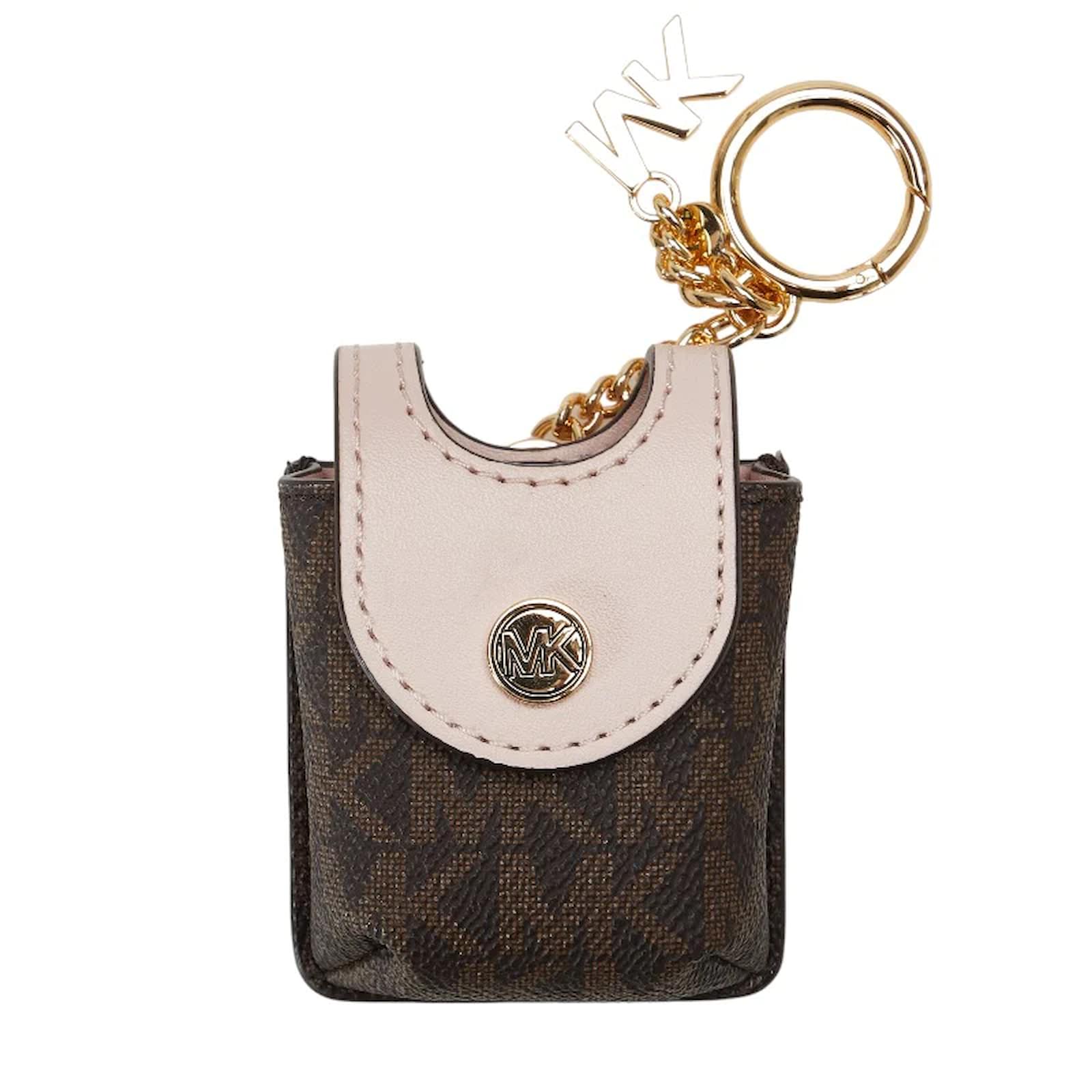 Porte cles en PVC pour desinfectant Michael Kors 35T1GGFN5B en tres bon etat Plastique Marron ref.1052615 Joli Closet