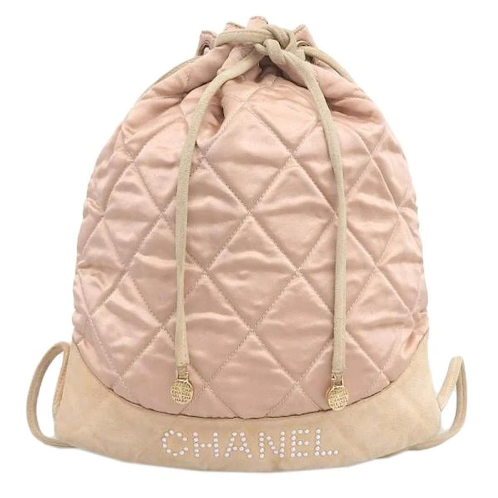 Chanel Quilted Satin Drawstring Backpack Pink Cloth ref.1066740 - Joli  Closet