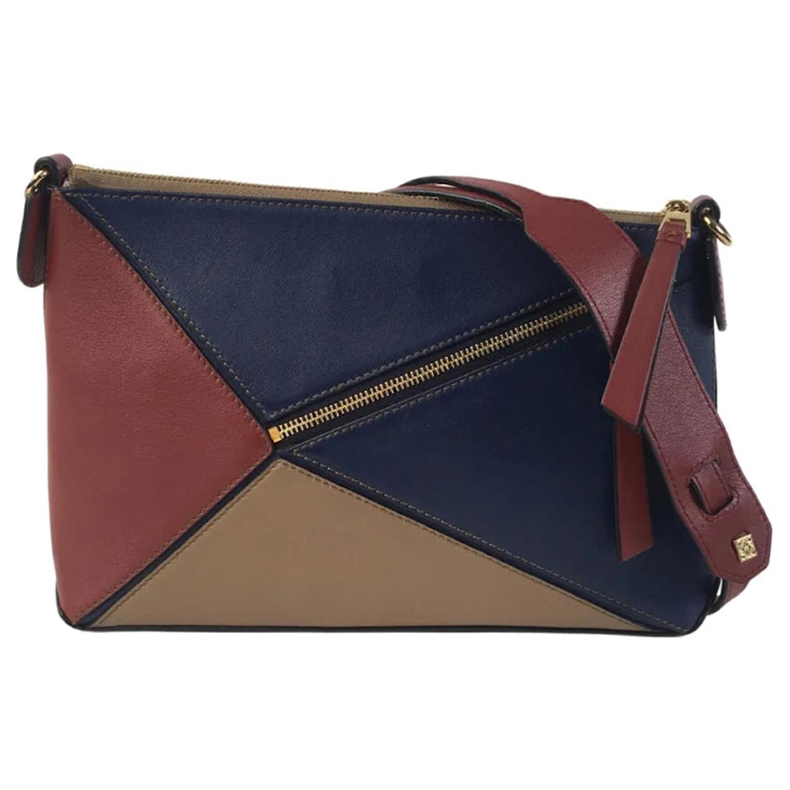 Puzzle discount pochette bag