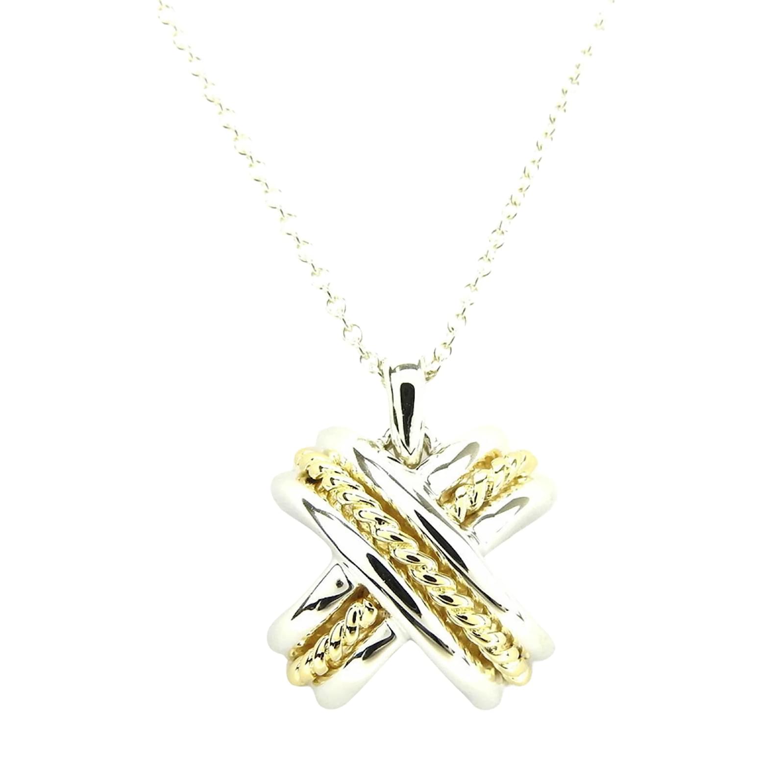 Tiffany & Co. Schlumberger Sixteen Stone circle pendant in gold with  diamonds. | Tiffany & Co.