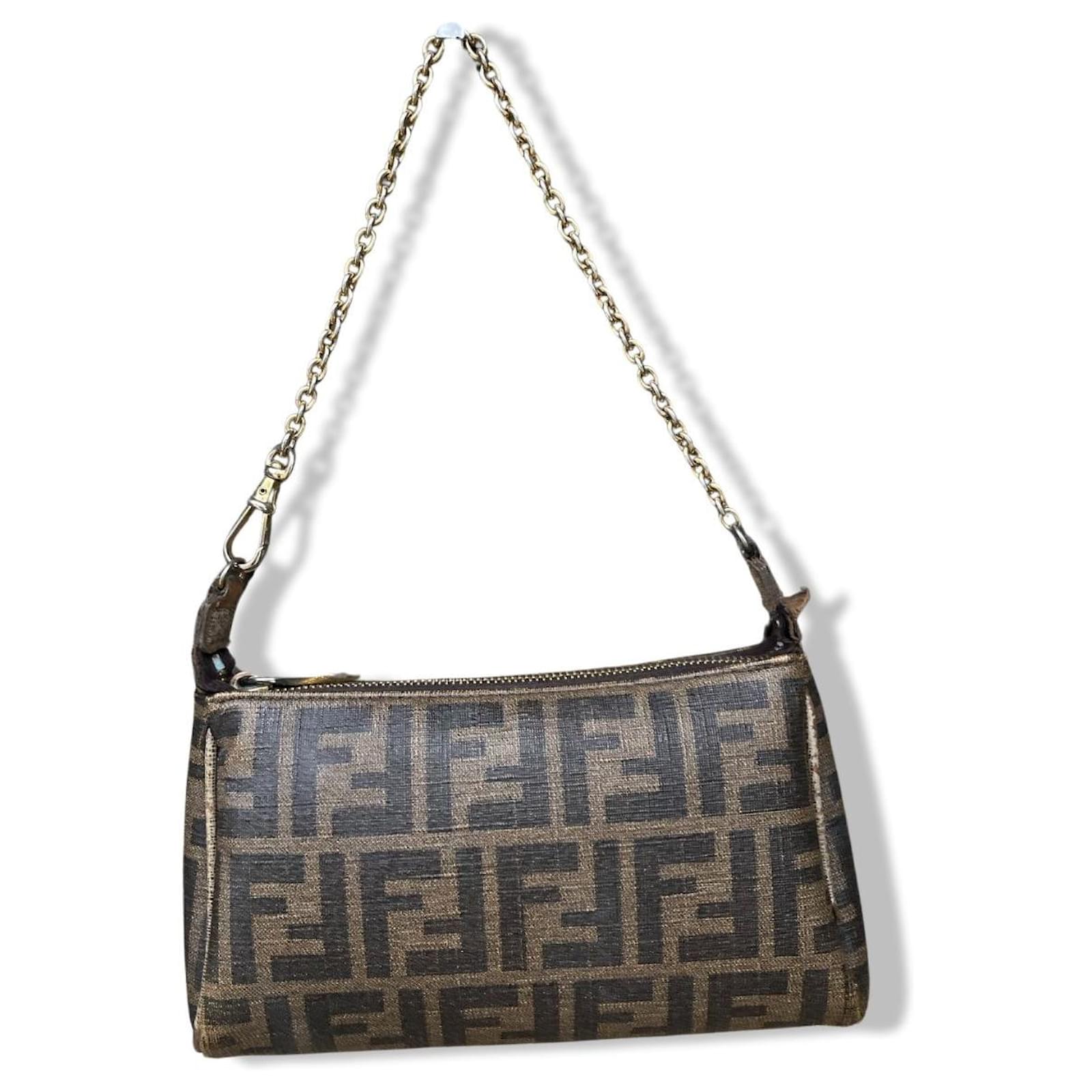 Bolsa Fendi Baguette Monograma