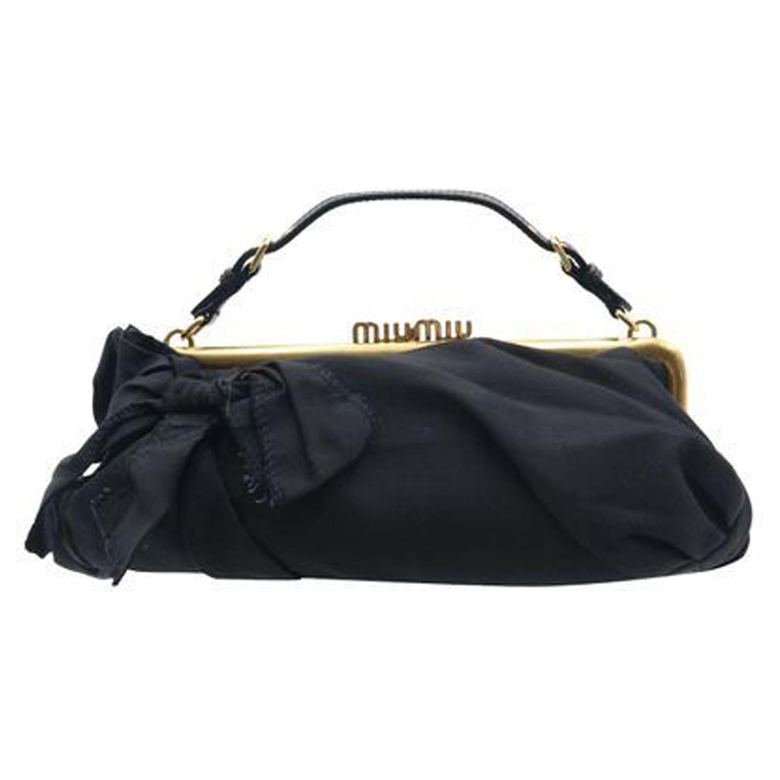 Miu Miu Pochette con fiocco nero e oro Metallo Joli
