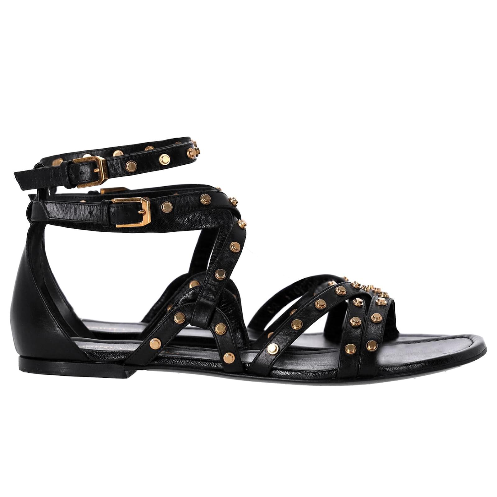 Saint Laurent Studded Strappy Flat Sandals in Black Leather ref