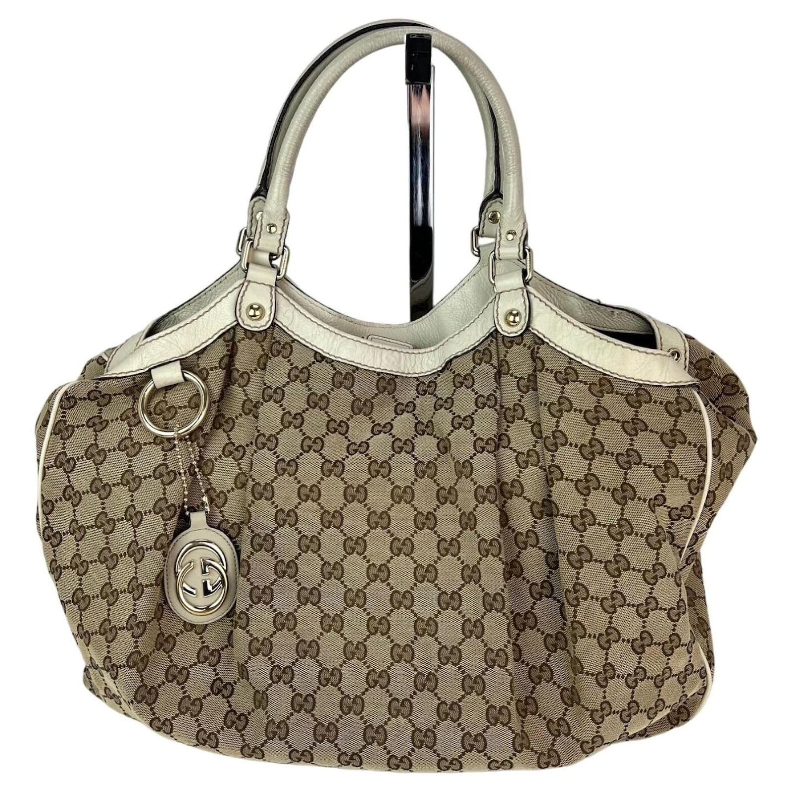 Borsa a mano bianca in tela Gucci Sukey con monogramma grande GG