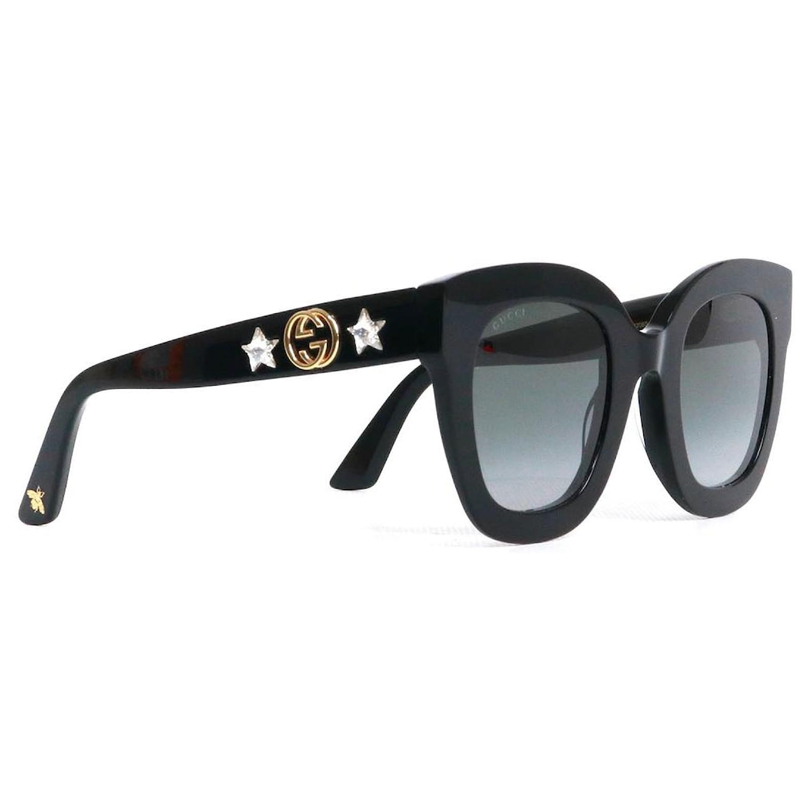 Lunettes de soleil GUCCI Plastique Noir Joli Closet