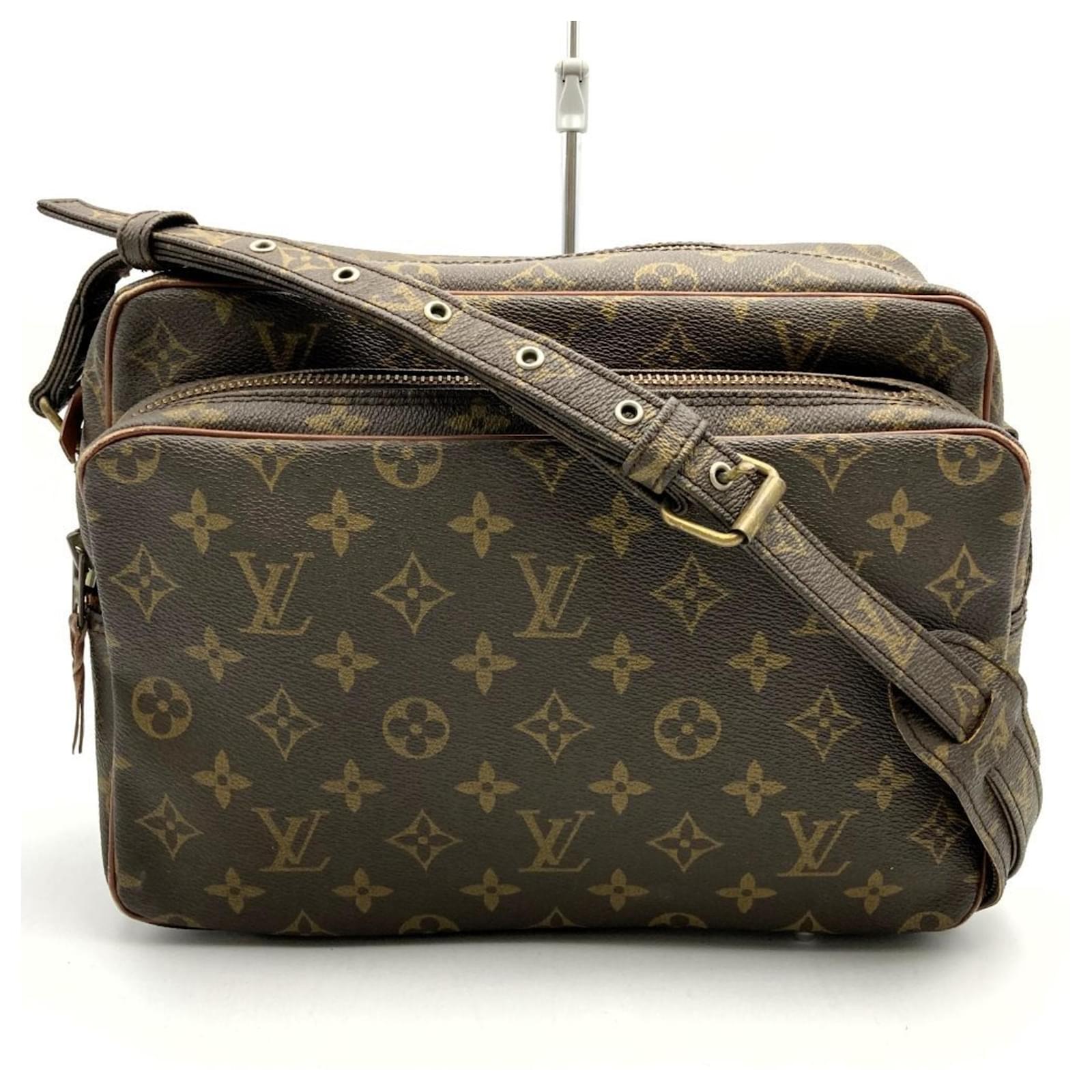 Migratour Schultertasche M45244 von Louis Vuitton Braun Lackleder 