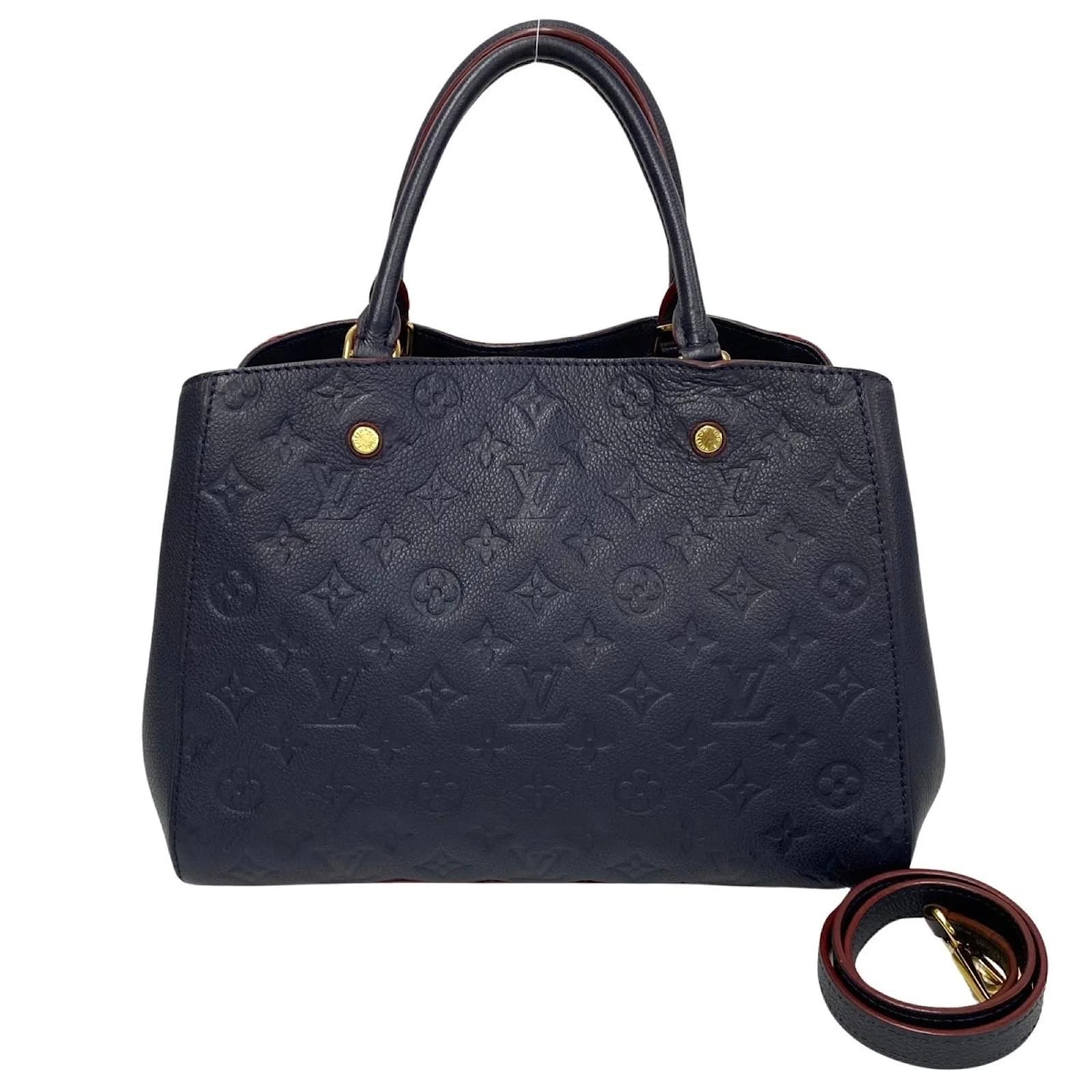 Louis Vuitton Montaigne MM Monogram Empreinte Handbag Red Navy blue Cloth  ref.1511904 - Joli Closet