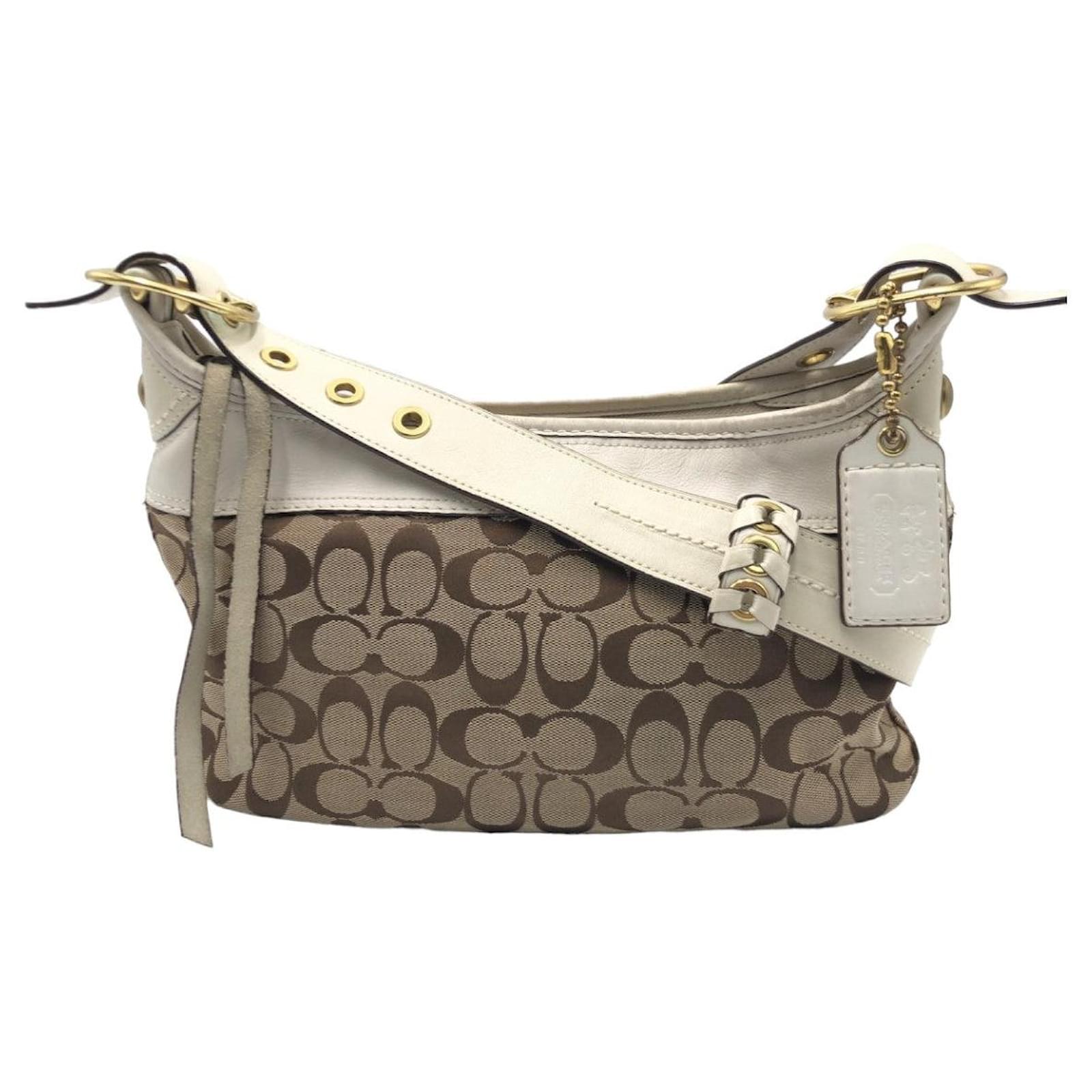 Brown ans top White Coach handbag