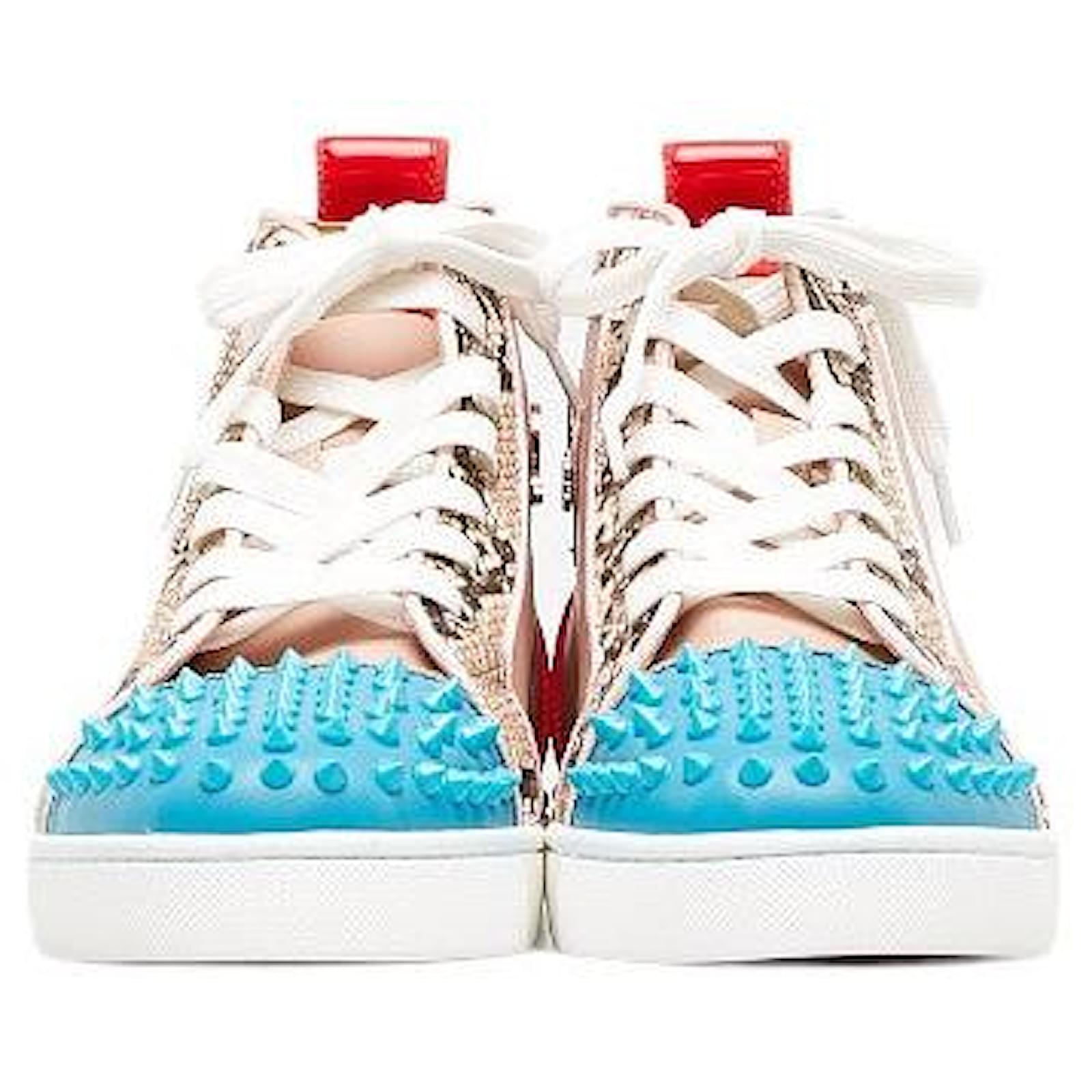 Baskets en cuir python à spikes Christian Louboutin