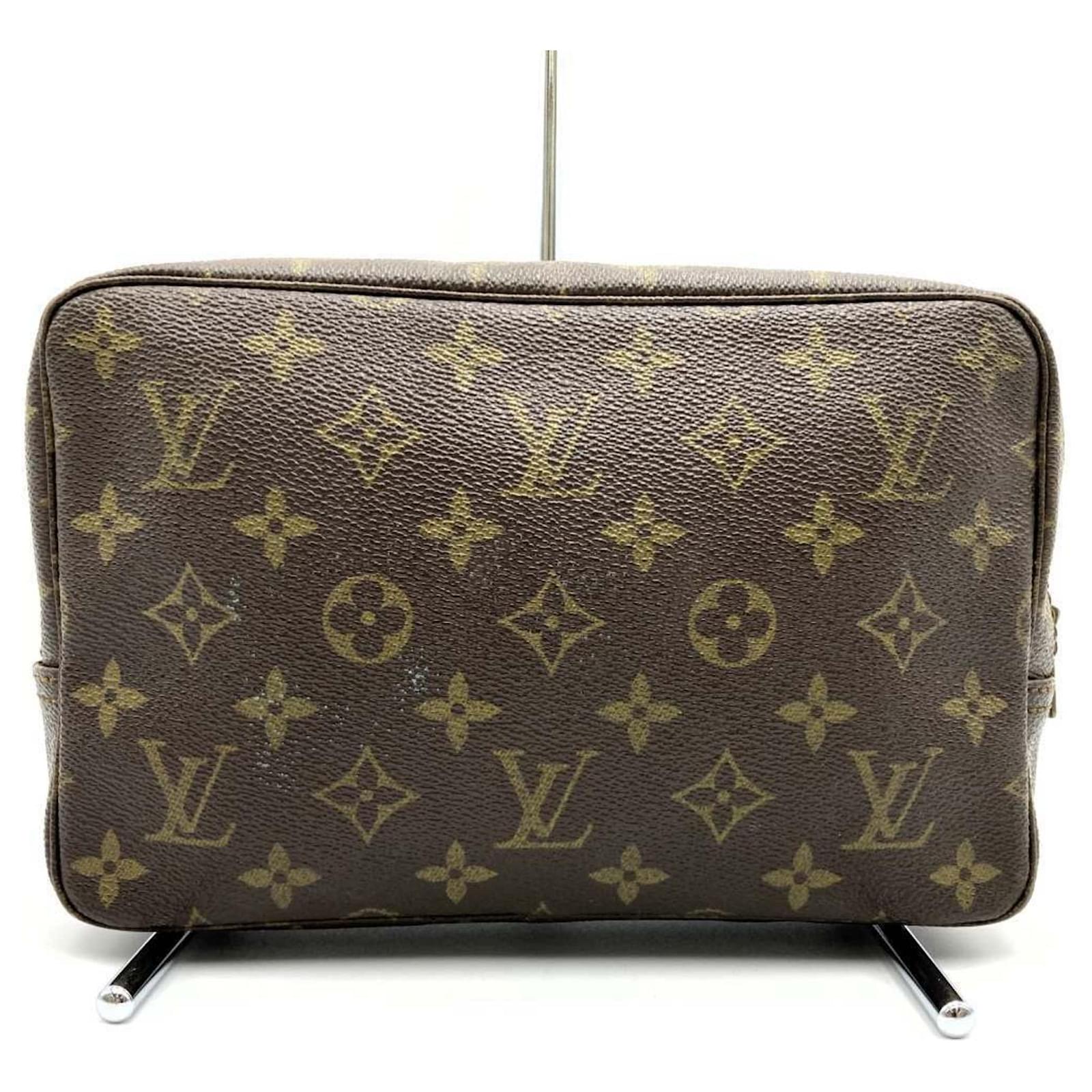 Lv monogram clutch bag deals