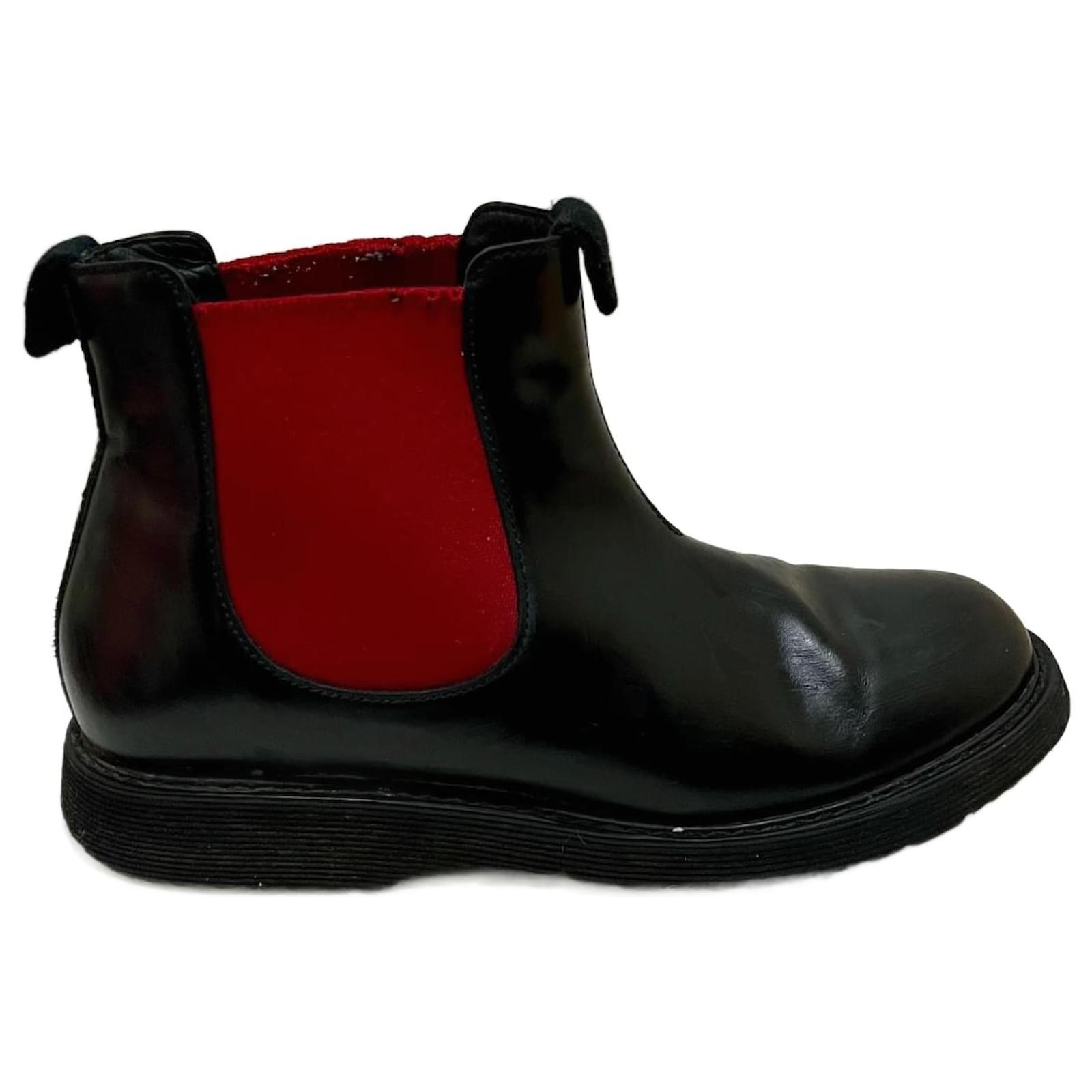 Schwarze Leder Chelsea-Stiefel von Prada Rot Joli Closet