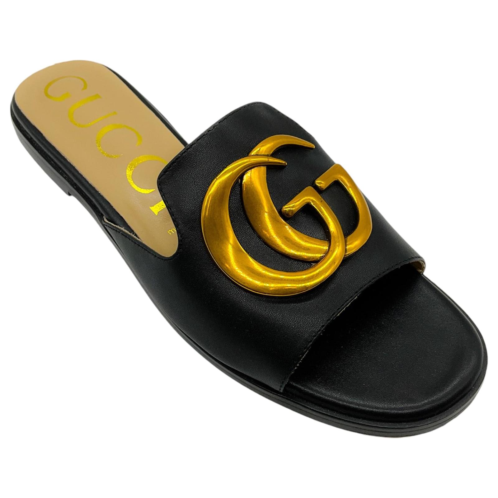 Sandalias Gucci GG negras doradas Negro Cuero Joli