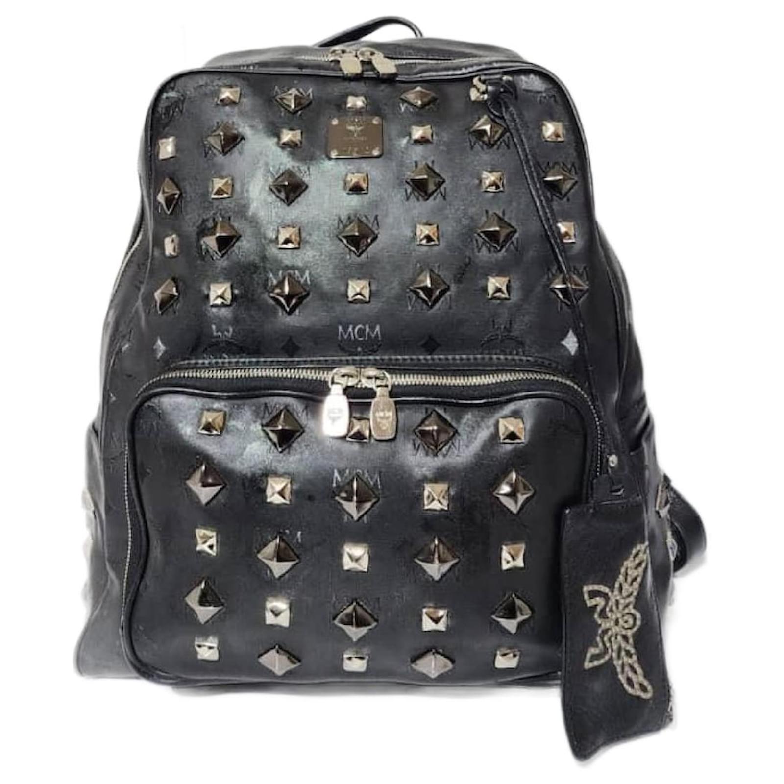 Mcm studded backpack sale