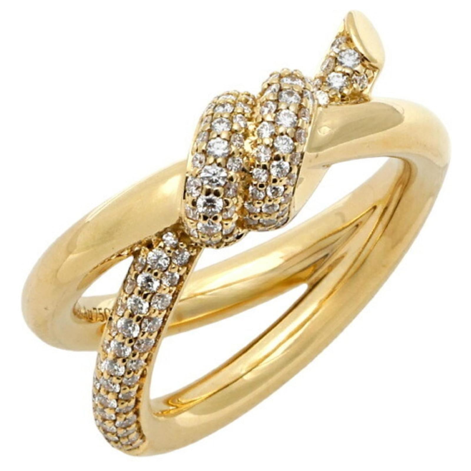 Tiffany Co Anillo de doble fila en nudo Tiffany en oro amarillo