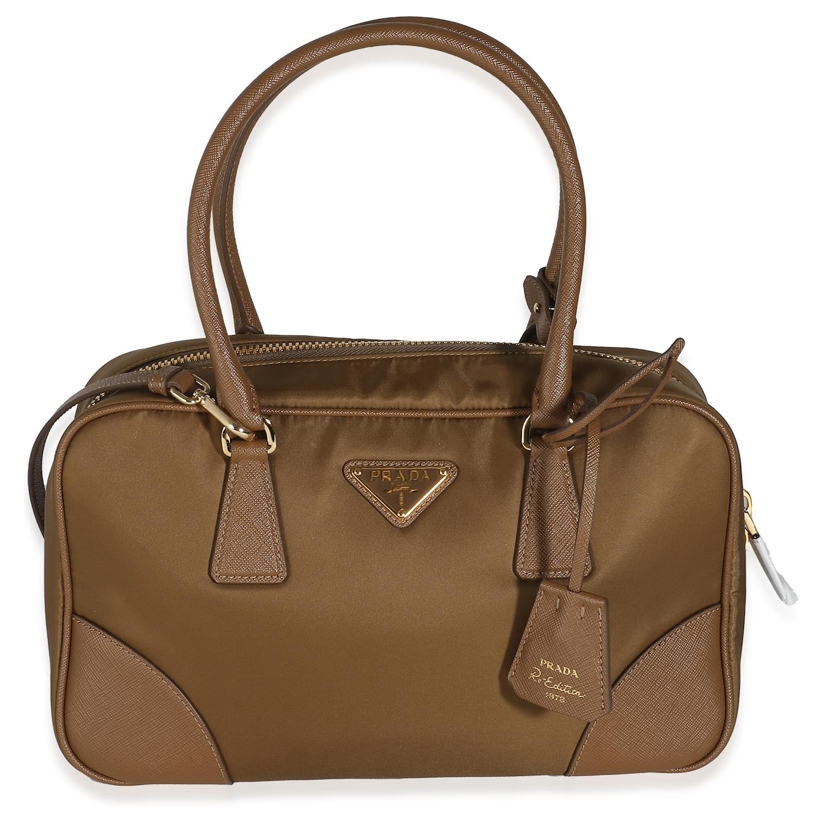 ハンドバッグ PRADA CARAMEL CANVAS MEDIUM RE-EDITION 1978 HANDBAG Prada Medium canvas handbag 1978 re-edition | The Fashion Square