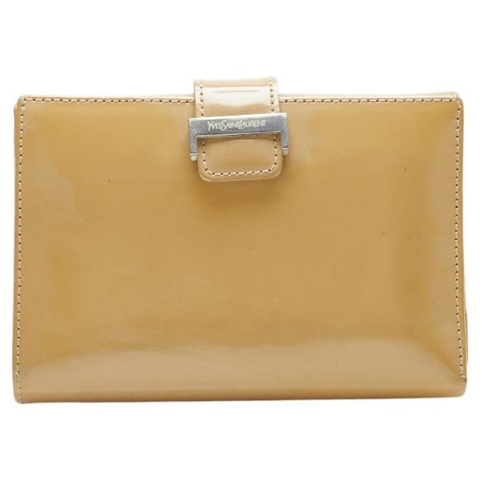 Yves Saint Laurent Billetera bifold de cuero Saint Laurent Beige