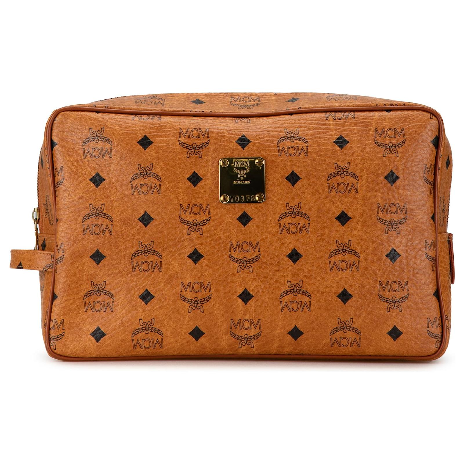 Brown MCM Visetos Coated Canvas Clutch Cloth ref.1664065 Joli Closet