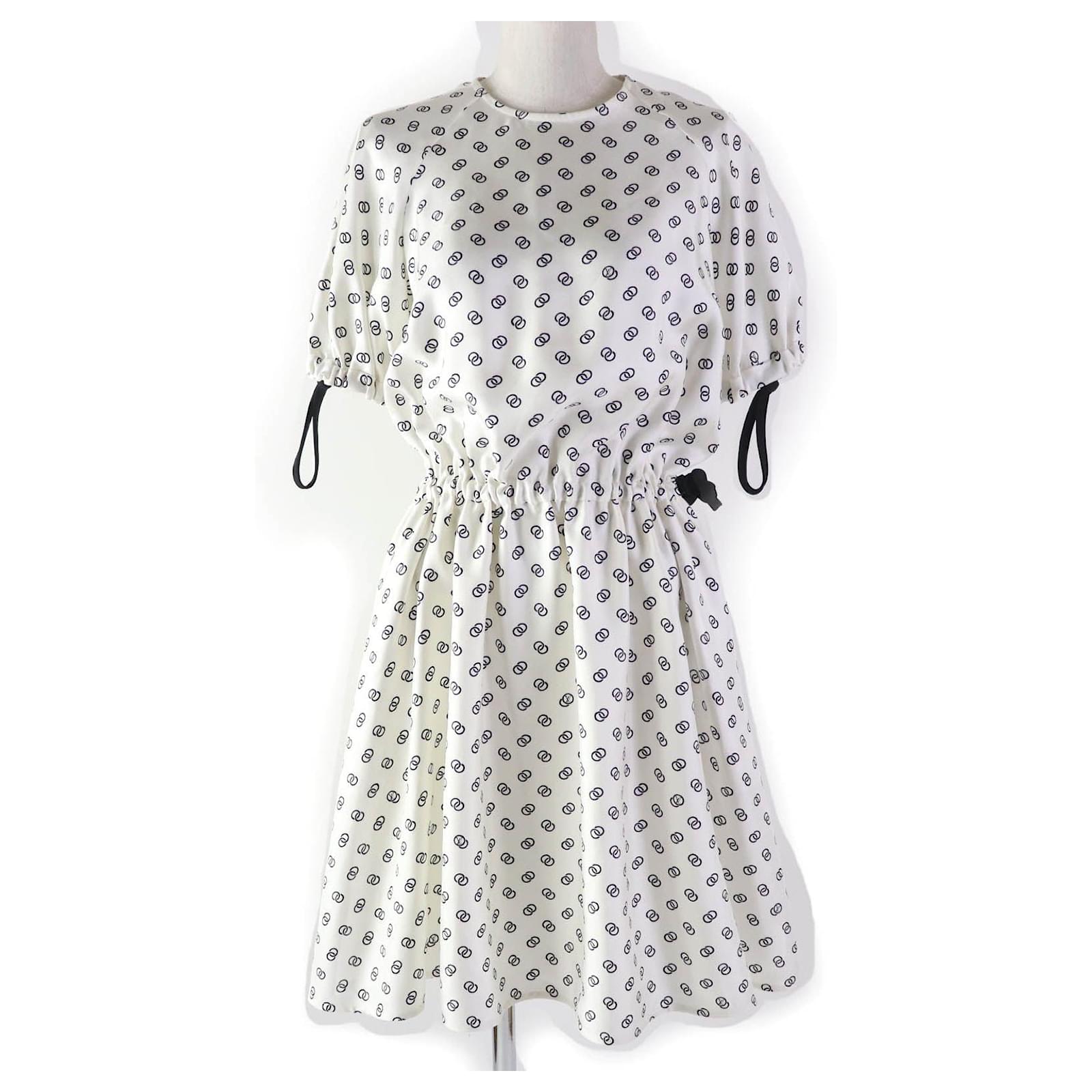 louis vuitton dresses for women Monogram Silk Shirt Dress Black. Size 38 A slim coordinating belt accentuates the waistline. Louis Vuitton Silk Chain Link