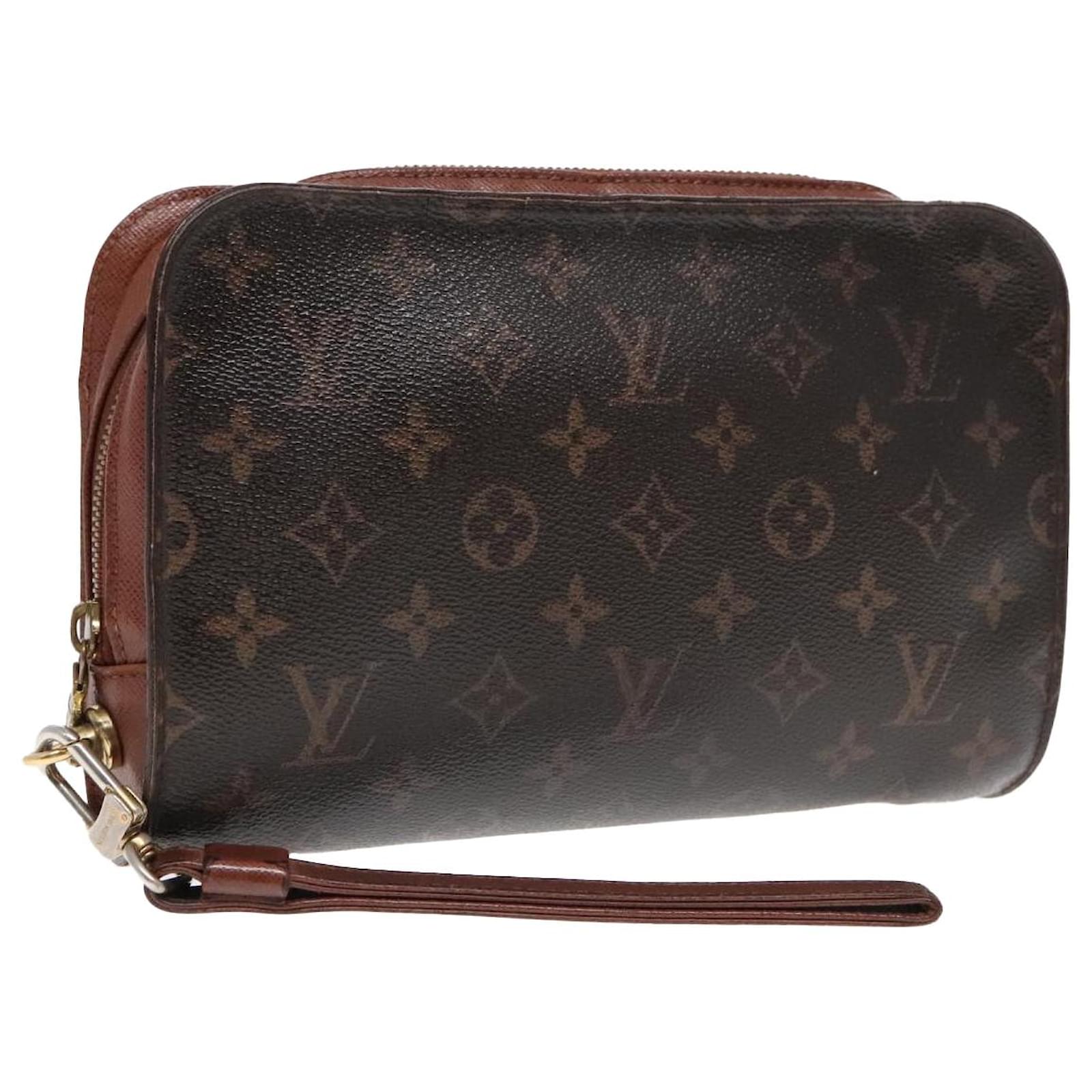 Louis Vuitton Orsay Wristlet LOUIS VUITTON Monogram Orsay Clutch