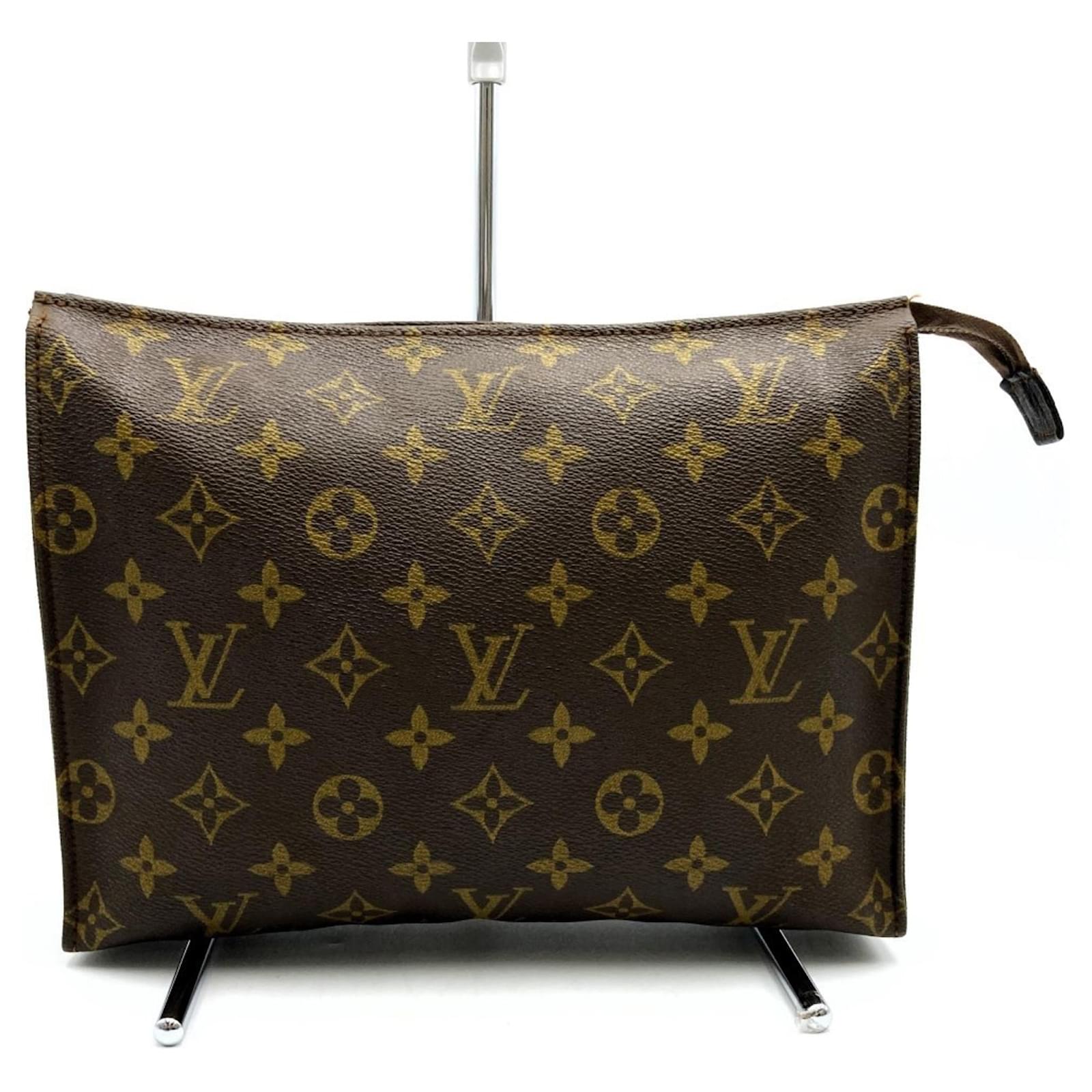 Louis Vuitton Poche Toilette 26 Pouch Brown Patent leather Cloth  ref.1746856 - Joli Closet