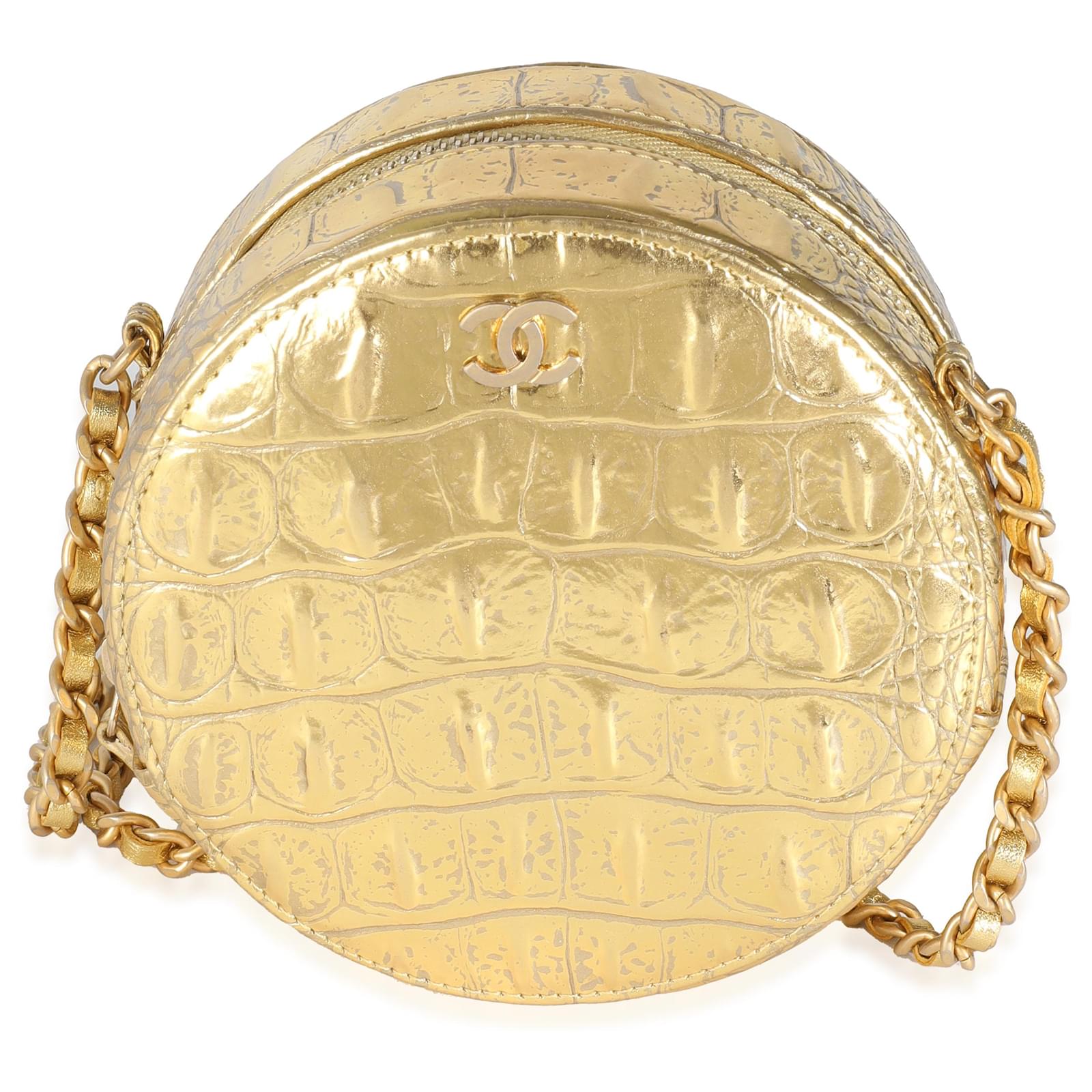 Runde Clutch aus metallisch goldenem Krokodil-geprägtem Kalbsleder