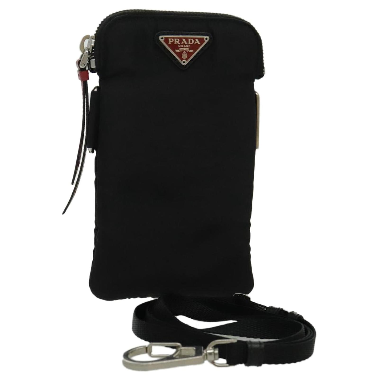 Pochette in nylon Prada con sacchetto antipolvere e carta di