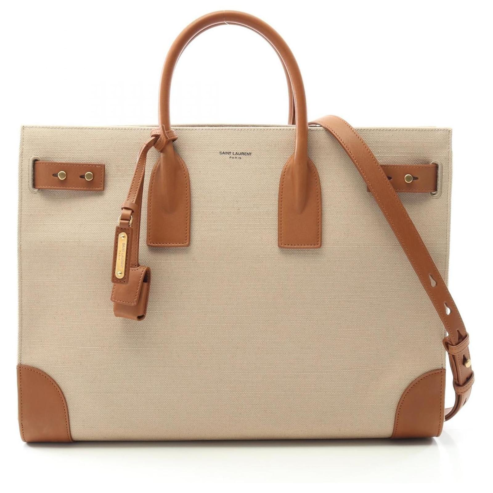 Yves Saint Laurent Sac de Jour Thin Large en toile et cuir de