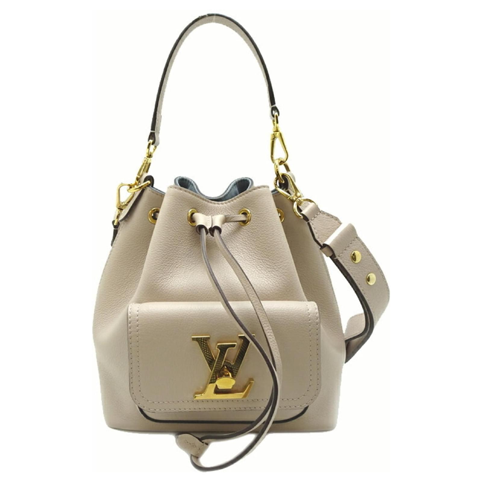 Louis Vuitton Lock Me Bucket NV Schultertasche Beige Leder ref