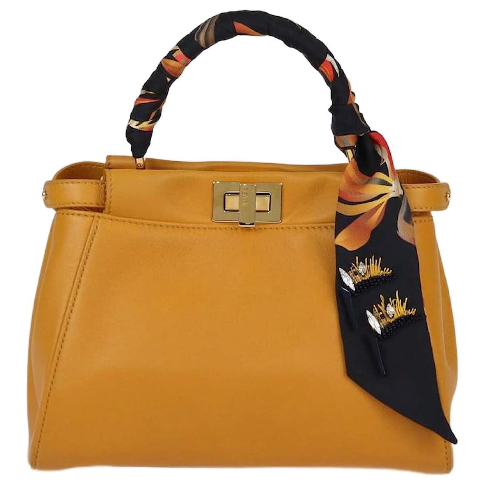 Bag Fendi Bandeau Top WornOnTV: Marlo's Brown Fendi Logo Headband