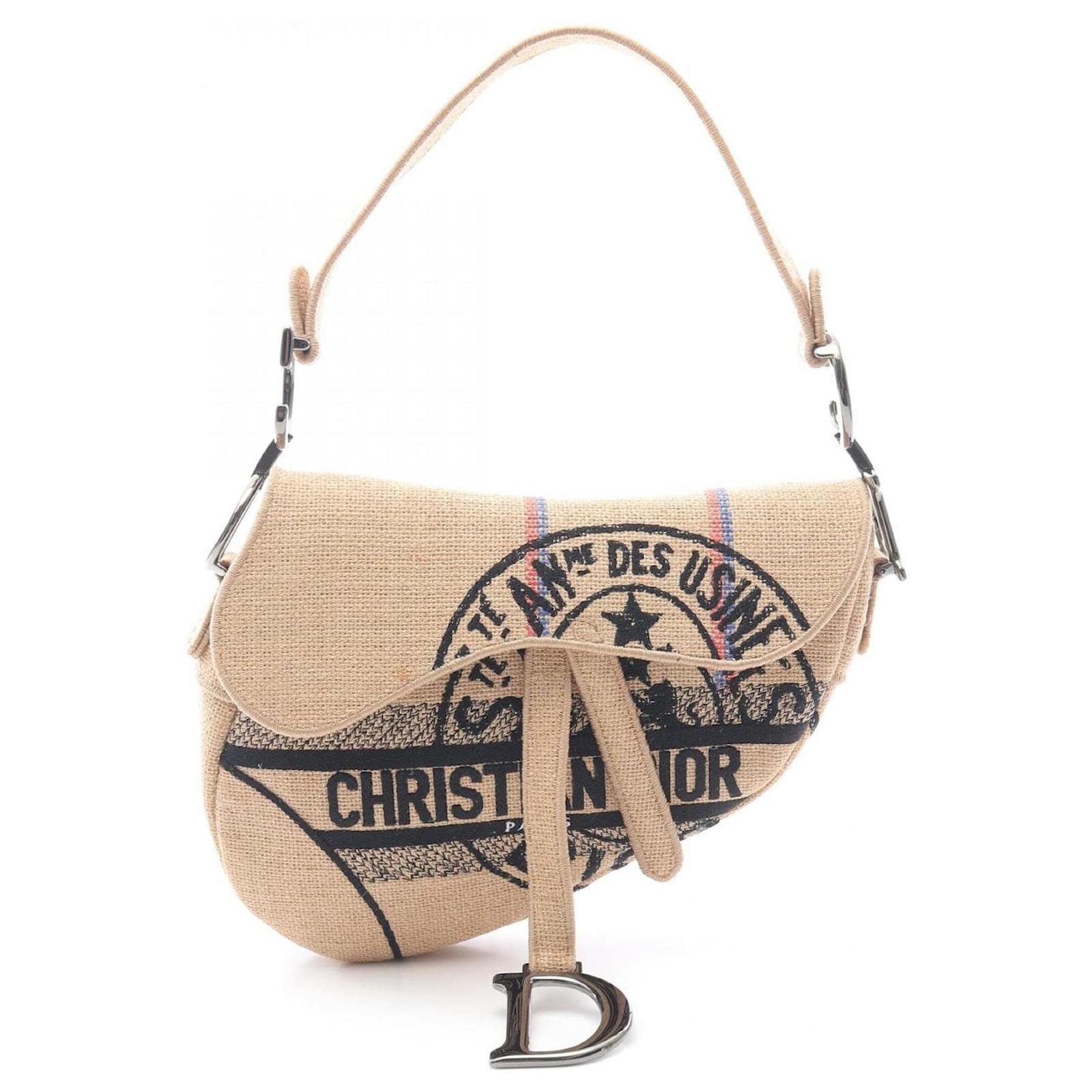 Bolso Saddle de rafia beige Christian Dior Joli Closet
