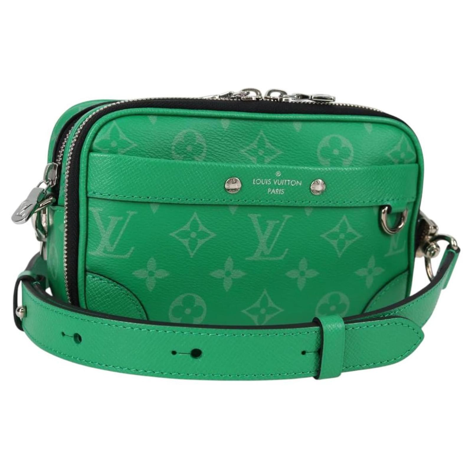LOUIS VUITTON Taiga Lama Alpha Wearable Wallet NV Bag M30997 LV