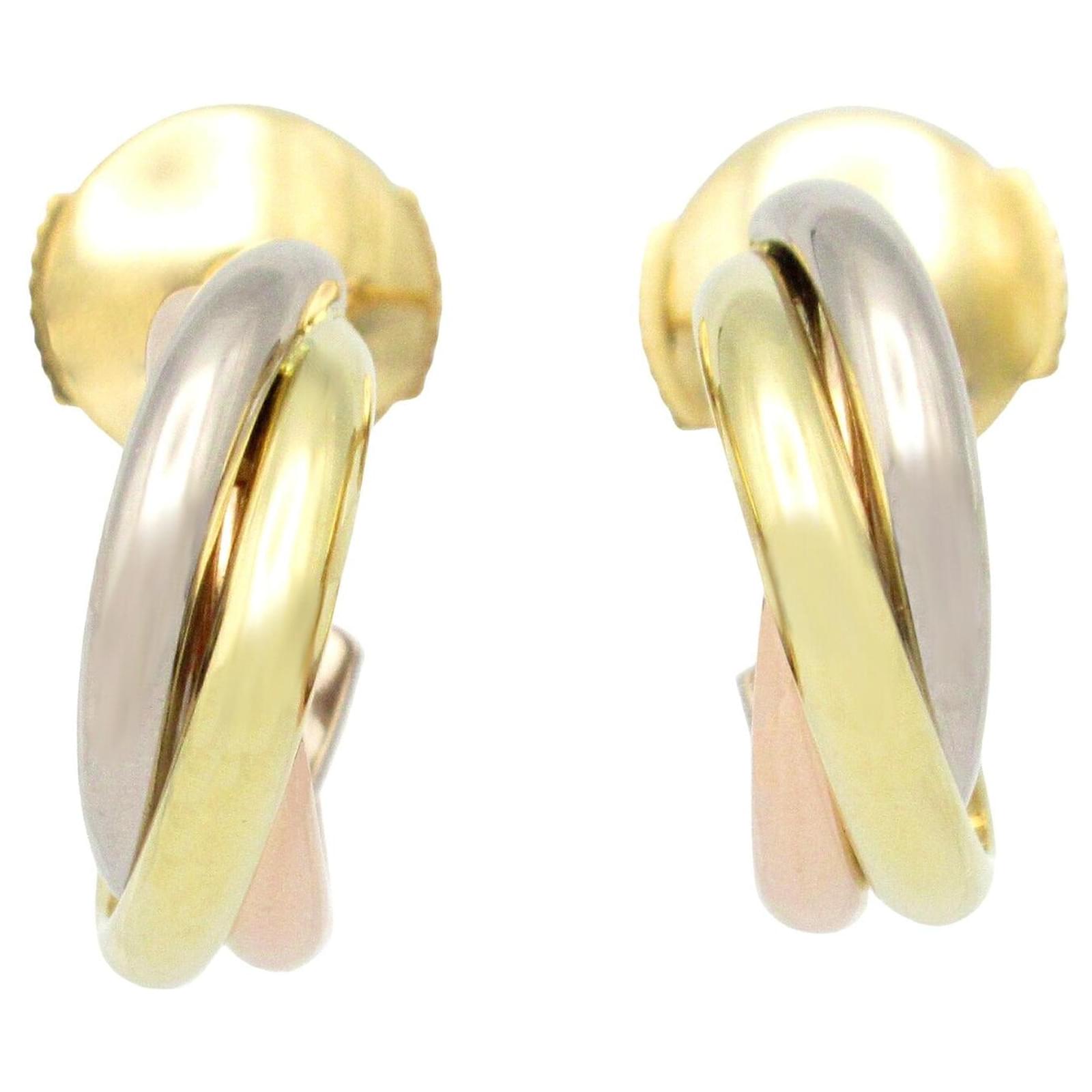 Pendientes Trinity Cartier en oro K18 Dorado Metálico