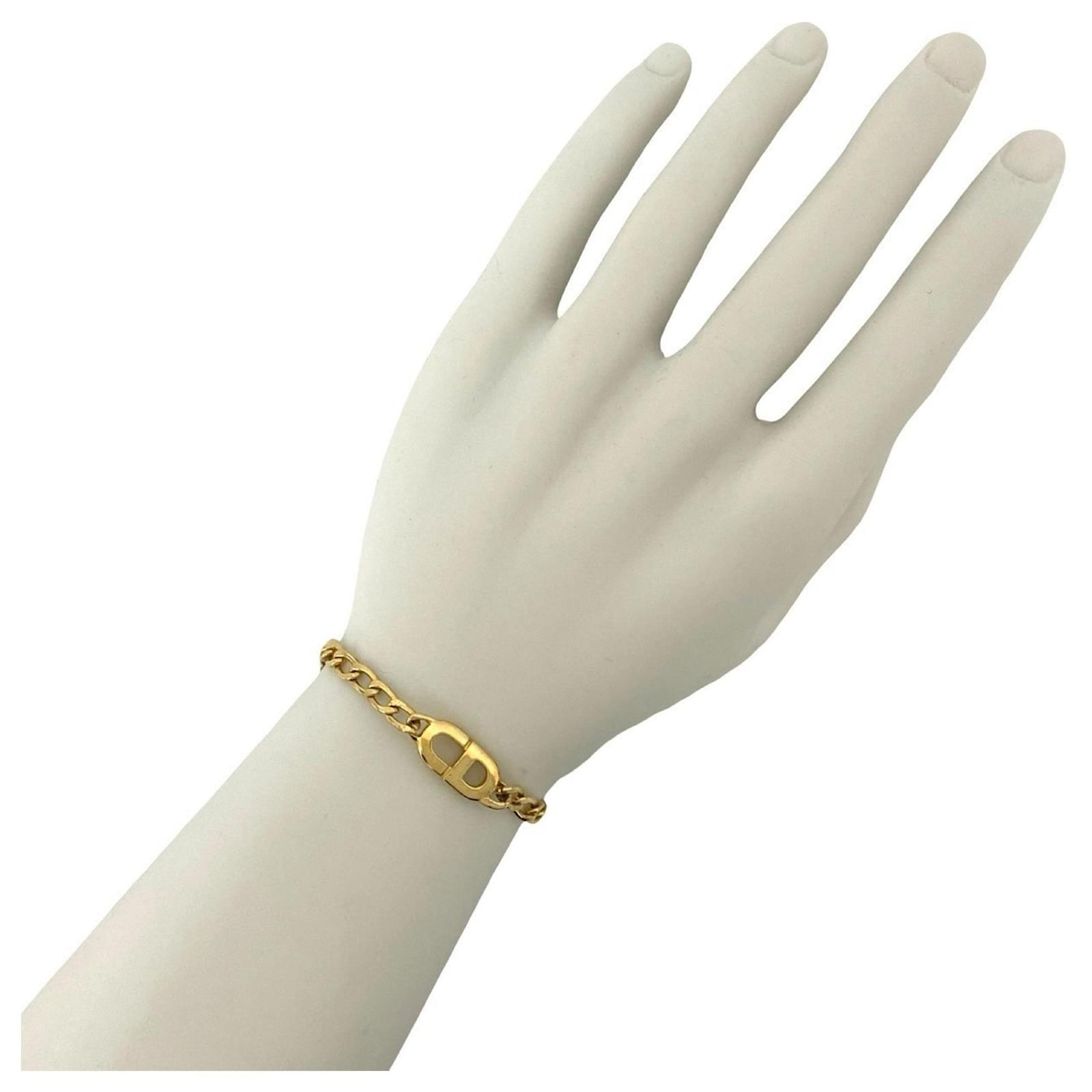 Christian Dior Gold Plated Charm Bracelet Golden Gold-plated ref