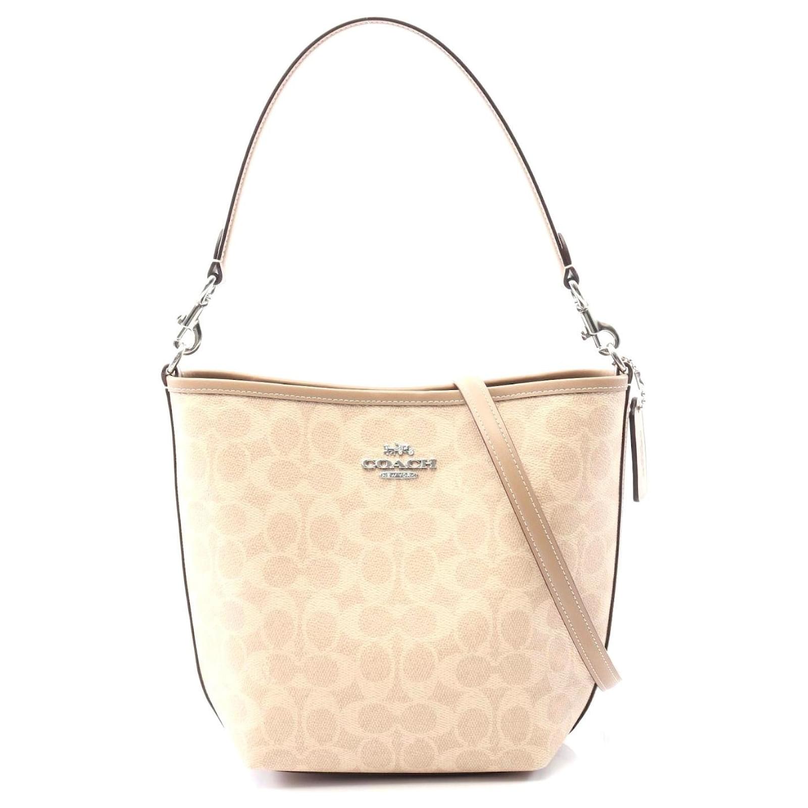 Borsa a secchiello City in PVC e tela Coach Marrone Beige ref