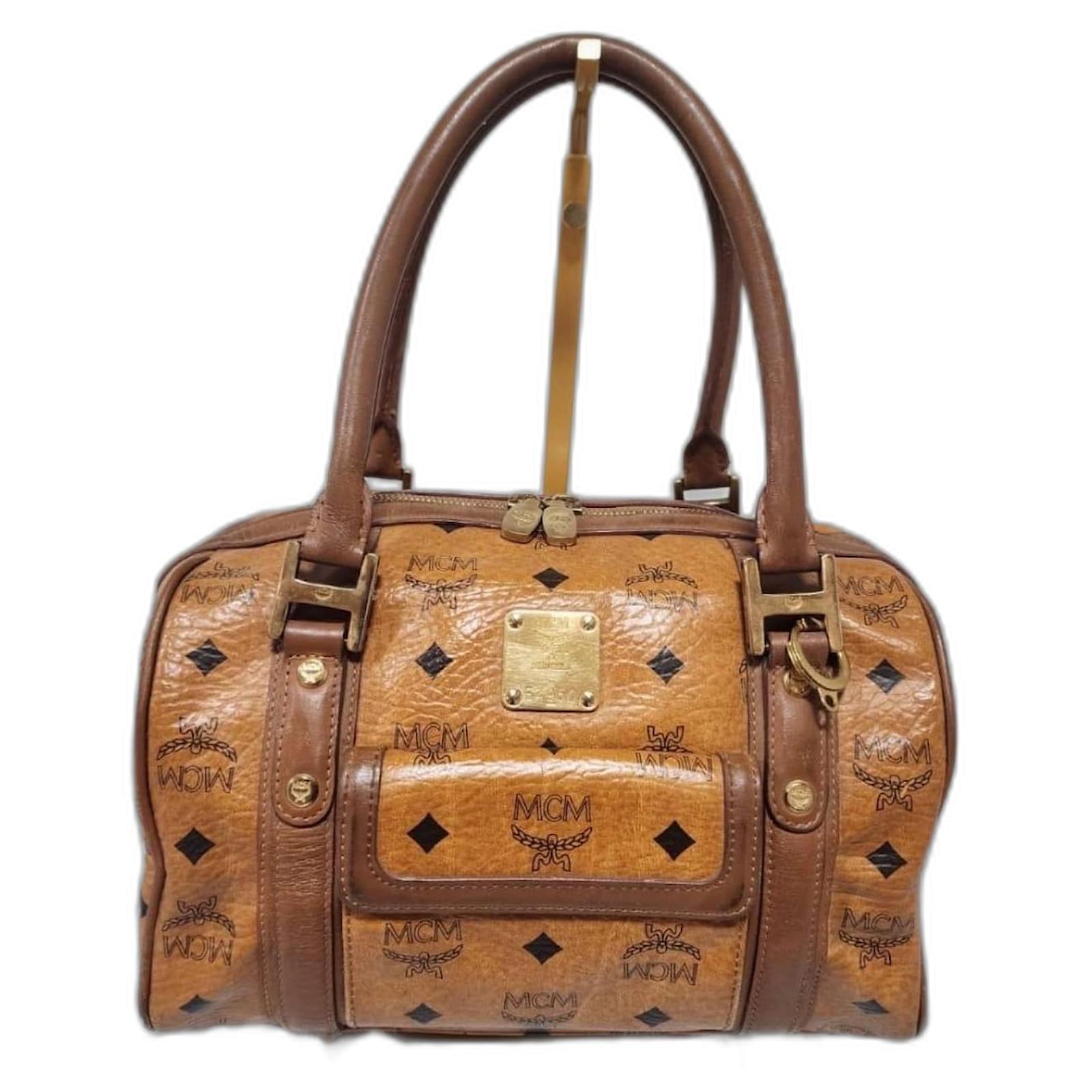 バッグ MCM Visetos Front Pocket Boston Bag MCM Visetos Coated Canvas and Leather Front Pocket Boston Bag