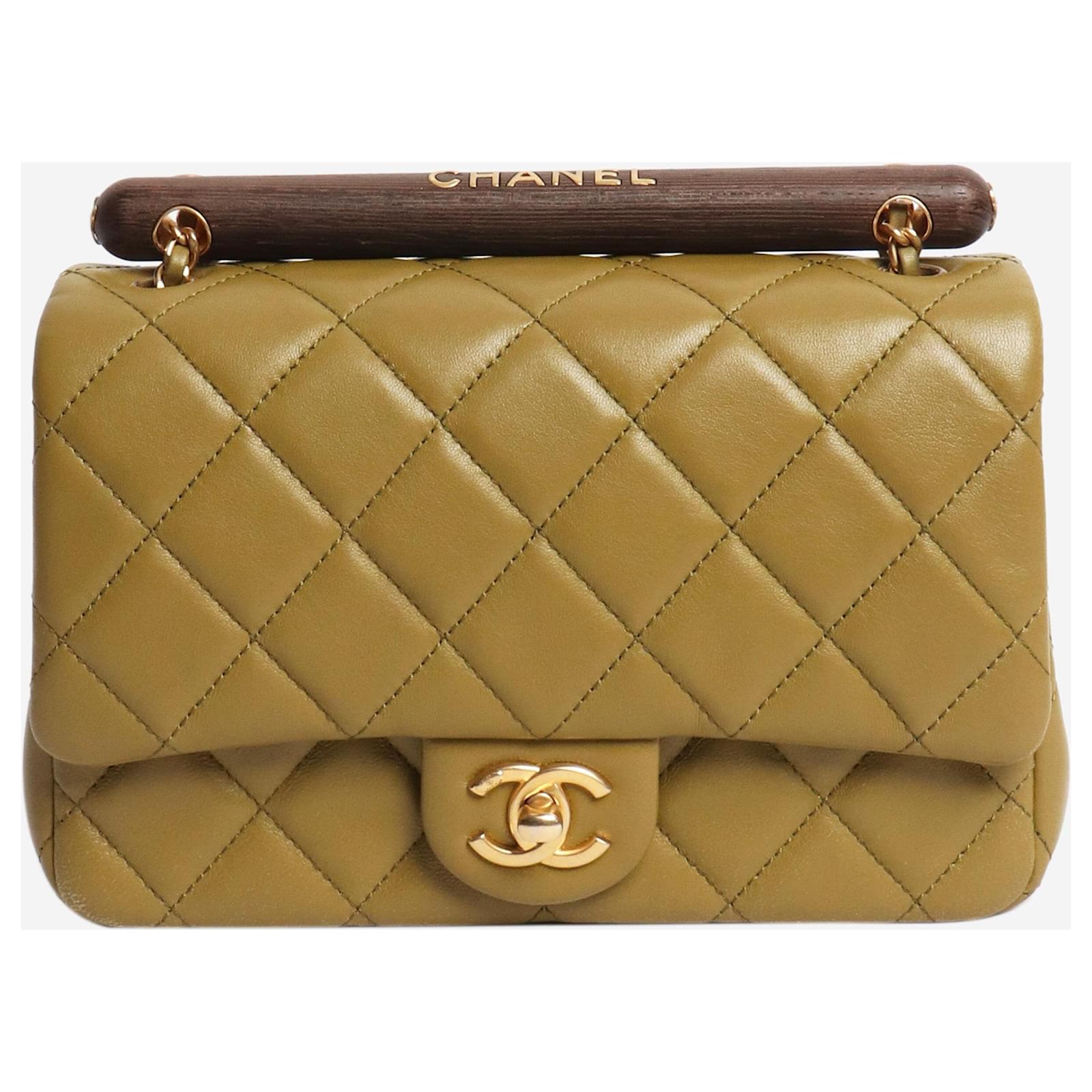 Chanel Olive green lambskin flap bag with a wooden handle Leather